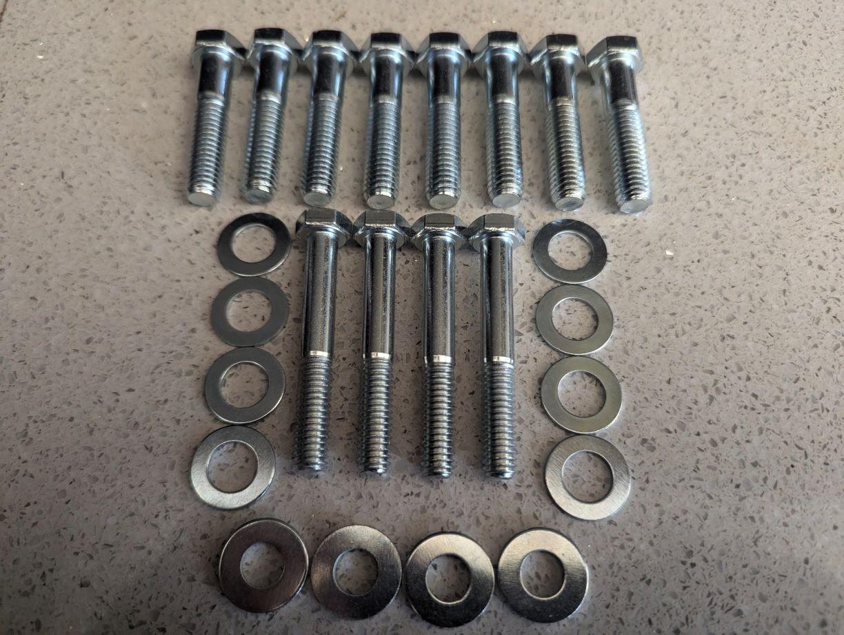 Ford 302 351 Cleveland 2v 4v RPM Air Gap Bolt Kit 393 408 with mounting bolts and washers laid out on a surface